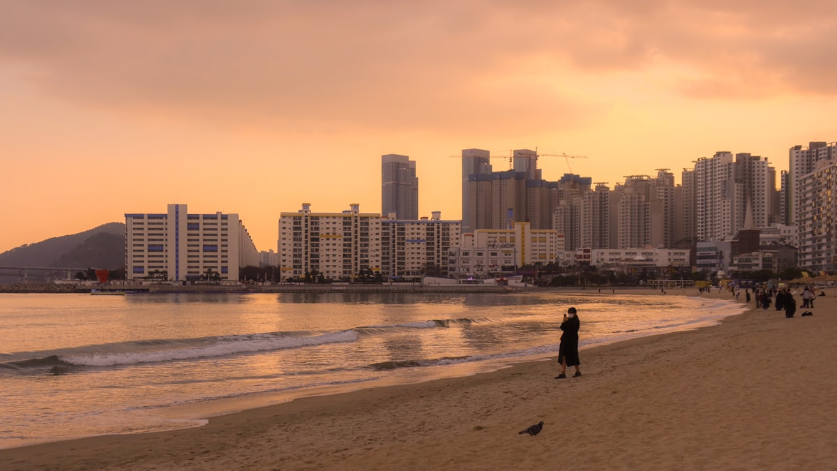People on a sandy beach in South Korea